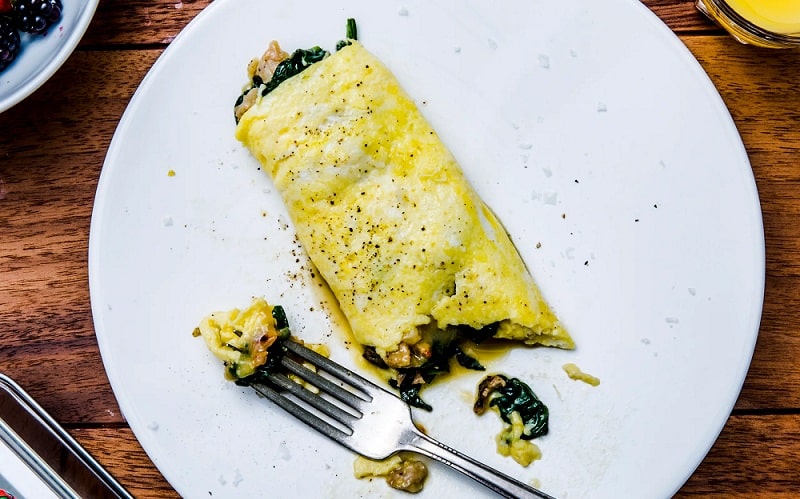 Smoked Chicken Sausage Omelette with Greens and Cheese