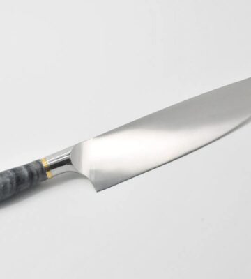 10-Inch-Chef-Knife-with-a-Ancient-Wood-Vein-Marble-Handle-a-Champagne-Cubic-Zirconia-Stone-at-the-Back-of-the-Knife-and-Brass-and-Stainless-Steel-Decorative-Rings