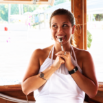 Smiling woman with a blank white apron
