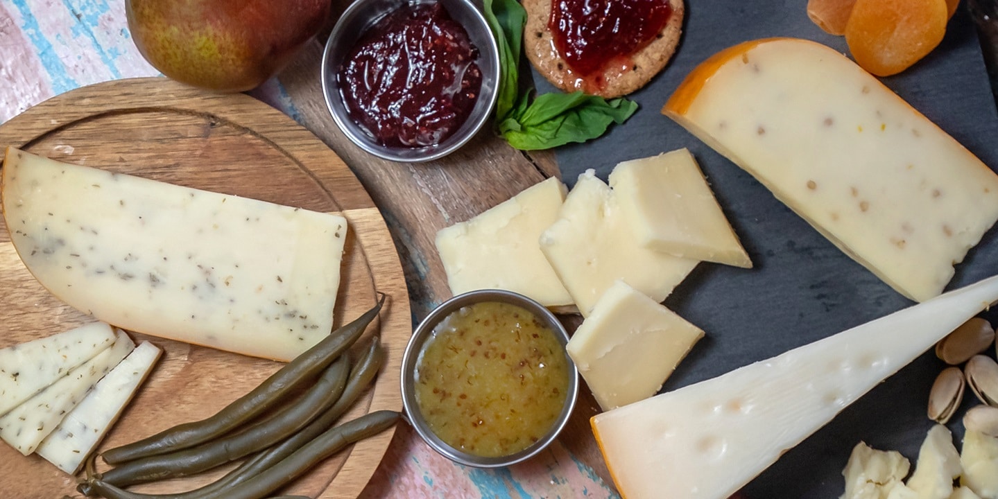 Mix and match any three varieties of Marieke® Gouda’s handmade artisanal cheese. All Marieke® Gouda is made using fresh raw milk from their family farm. Each wheel is carefully handcrafted with the finest Old World techniques and they age the Gouda to perfection on Dutch Pine planks for a minimum of 60 days. • True Farmstead Cheese • Raw milk • Aged cheese • Made in Wisconsin, USA • Female Owned and Operated business CHOOSE FROM: -Aged Gouda (9-12 months) – Deep nuanced aromas bring this Aged Gouda to a delectable level and is a true delight for those who are looking for the perfect aged cheese. -Foenegreek – Marieke® Farmstead Gouda Foenegreek Raw Milk Cheese is reminiscent of maple syrup and is a dessert all in itself! It is creamy, rich, and elevated by sweet notes paired with nutty flavor notes. -Smoked Gouda – This creamy and buttery raw milk Gouda is gently smoked over natural hickory wood. -Smoked Cumin Gouda – Subtly spiced farmstead gouda enhanced by being smoked over natural hickory wood. -Summer Fields Gouda – Marieke® Farmstead Gouda Summer Fields is earthy and sharp with notes of rosemary and thyme. -Thorp Red Wine Gouda – Marieke® Farmstead Gouda Red Wine Raw Milk Cheese features hint of Thorp Red Wine and evokes feelings of summer breezes and crisp nights. -Truffle Gouda – Marieke® Farmstead Gouda Truffle Cheese is decadently rich and features savory aromas and flavor notes of truffle with exceptional woody flavor notes brimming at the surface. -Young Gouda (2-4 months) – Marieke® Farmstead Gouda Young (aged 2-4 months) is creamy and buttery with an irresistible yet mild taste that is perfect for any occasion! Size: • Three (3) wedges of cheese, 5oz each