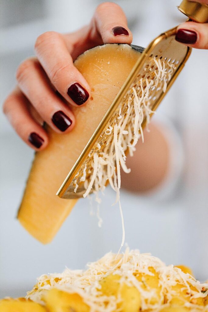 shaving Parmigiano Reggiano