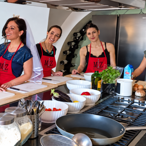 Bridal cooking class in branded aprons Bridal cooking class in branded aprons