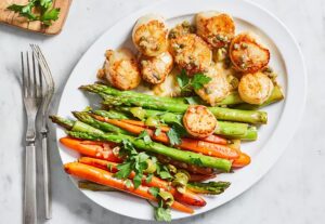 Scallops and Spring Vegetables with Olive-Caper Sauce